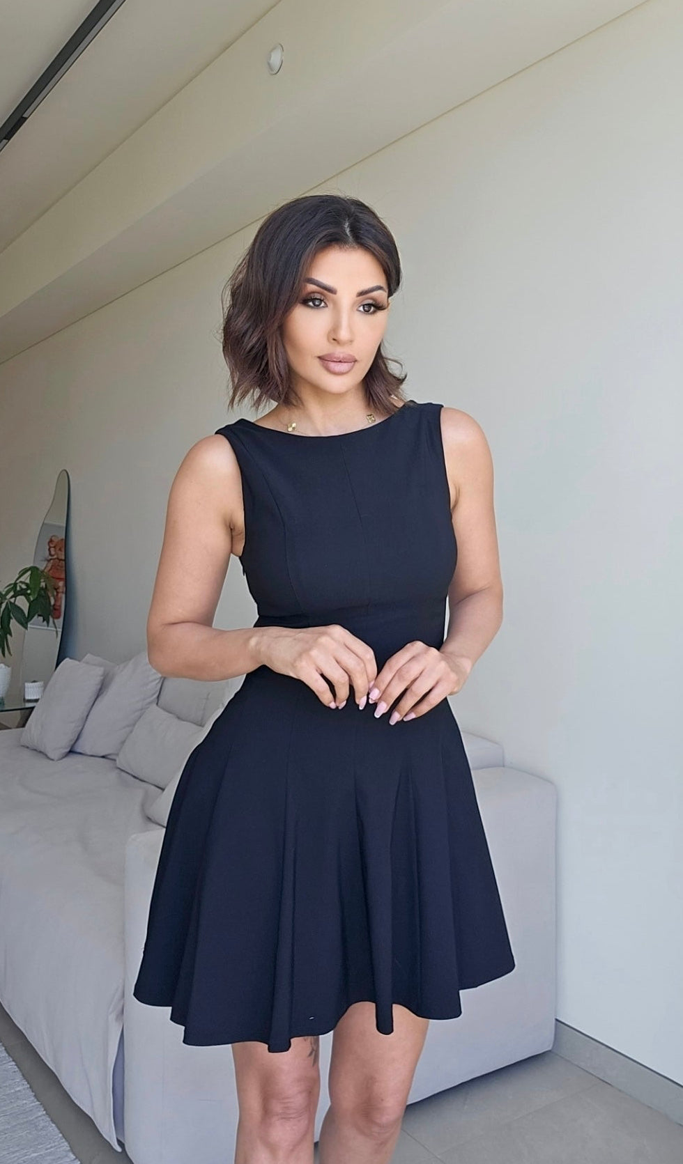 Black sleeveless panelled skater mini dress