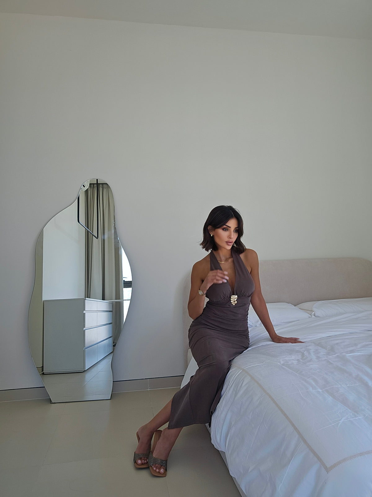 Ruched halter maxi dress with a gold hardware detail
