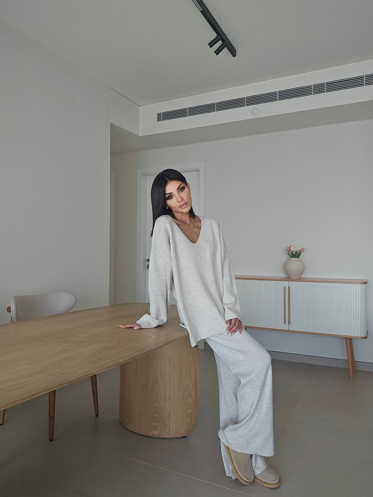 Soft knit V-neck sweater and matching wide-leg trousers co-ord set