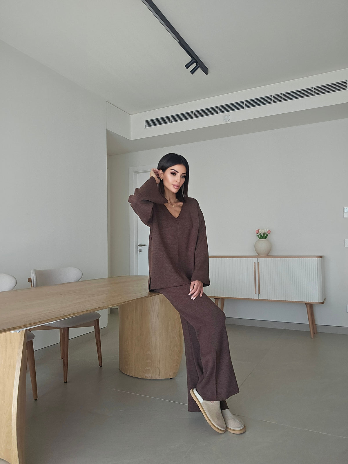 Soft knit V-neck sweater and matching wide-leg trousers co-ord set