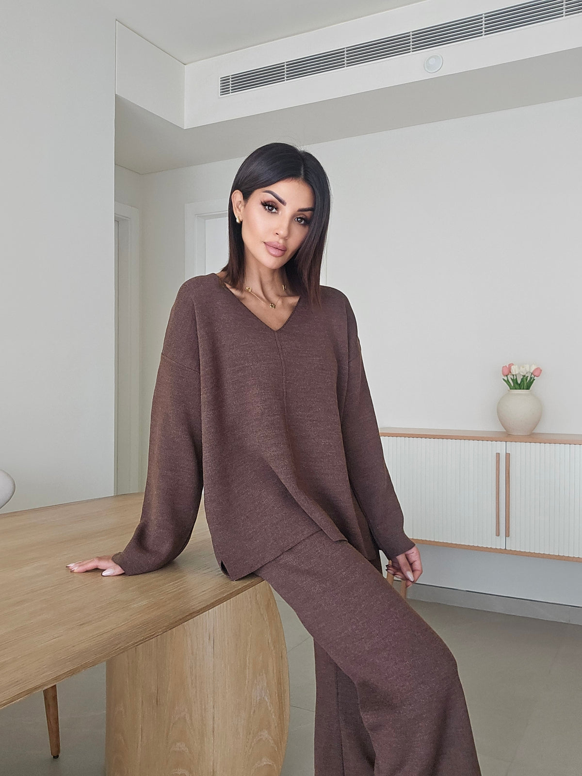 Soft knit V-neck sweater and matching wide-leg trousers co-ord set