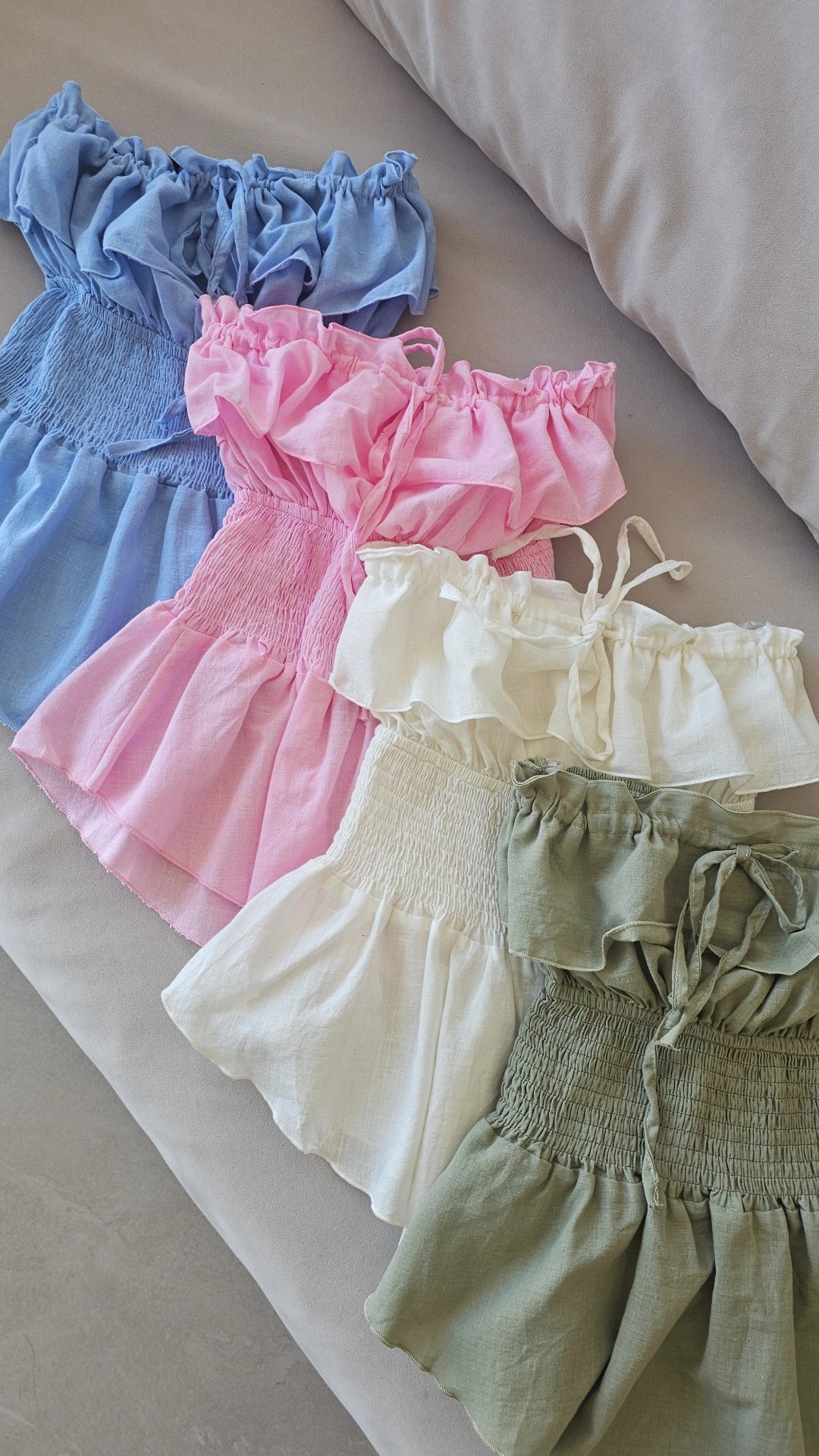 Off-the-shoulder strapless smocked peplum top