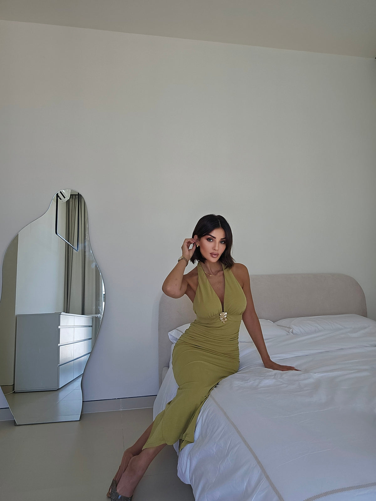 Ruched halter maxi dress with a gold hardware detail