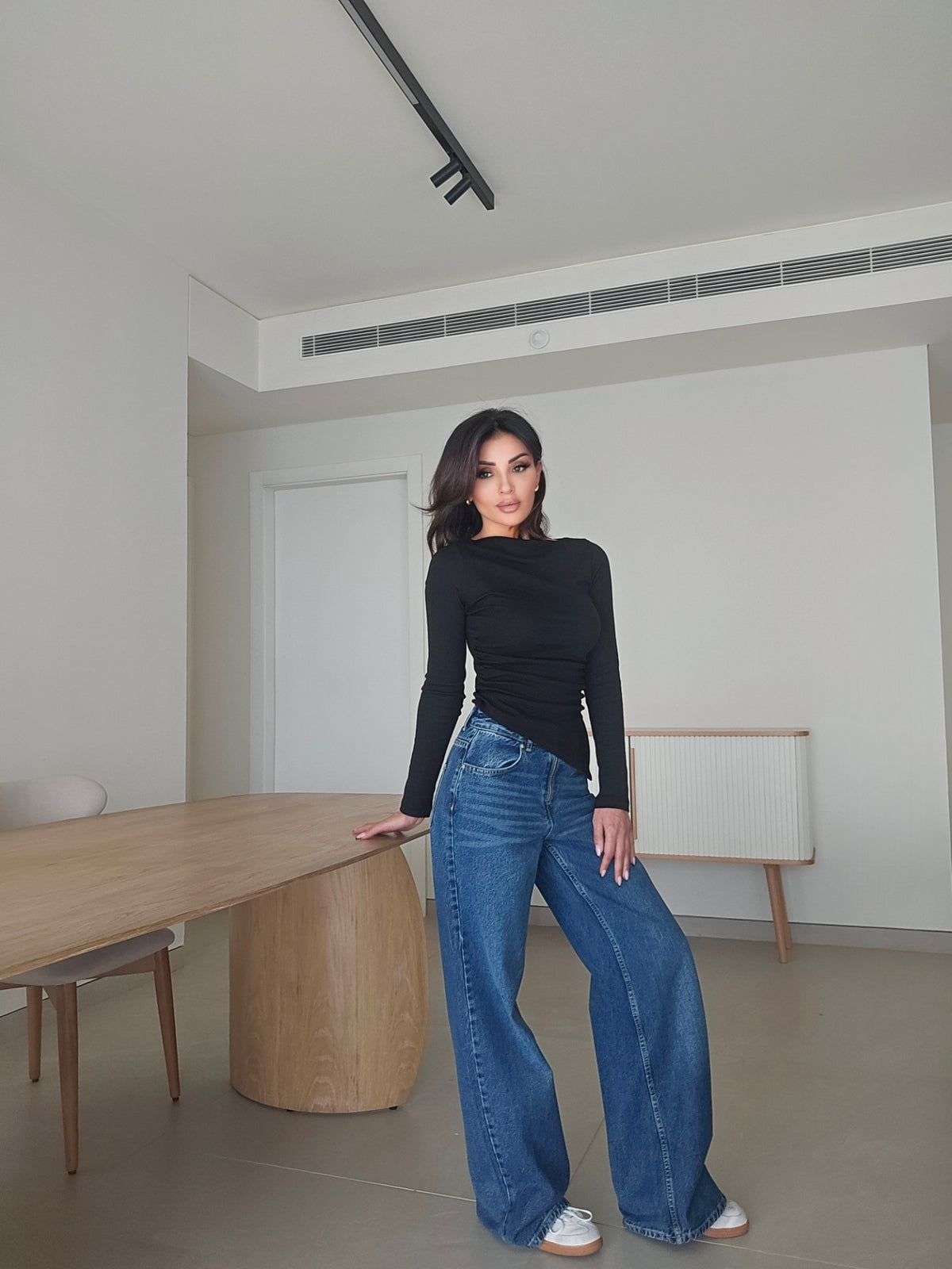 Asymmetric long-sleeve side-cinched boatneck cotton top