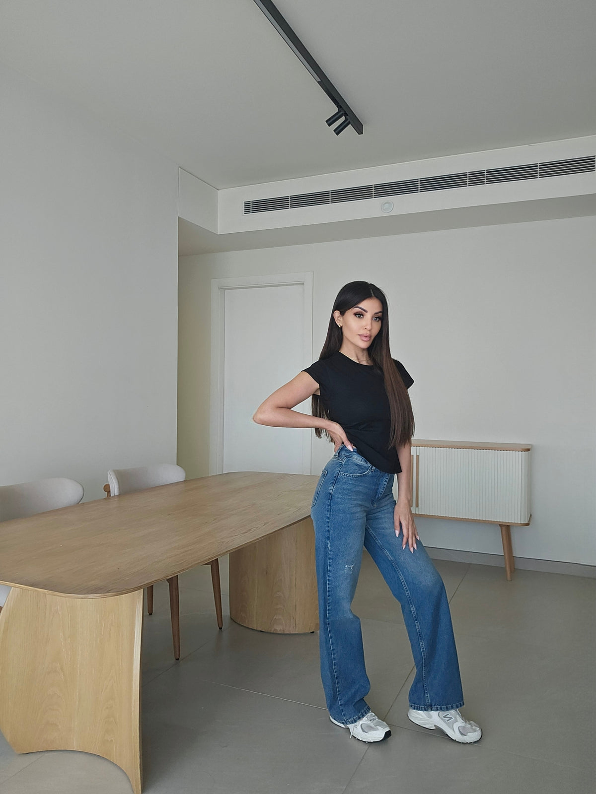 Medium-wash high-rise wide-leg denim jeans