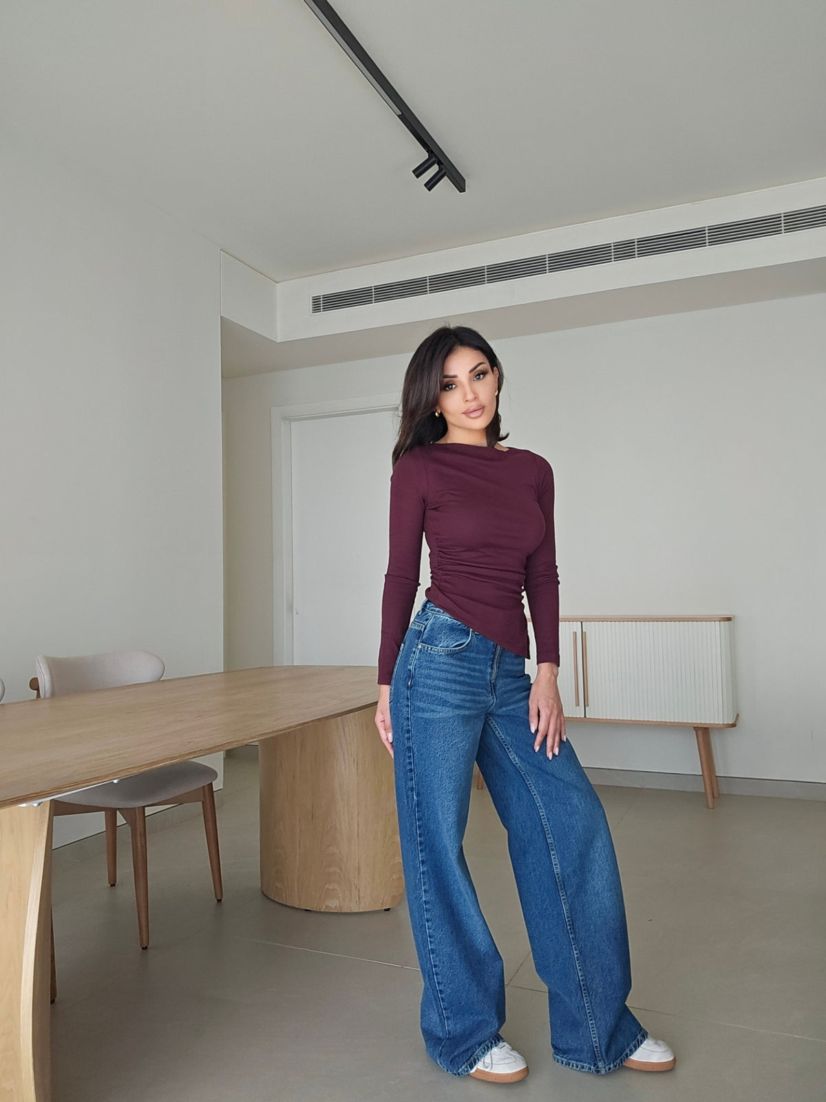 Asymmetric long-sleeve side-cinched boatneck cotton top
