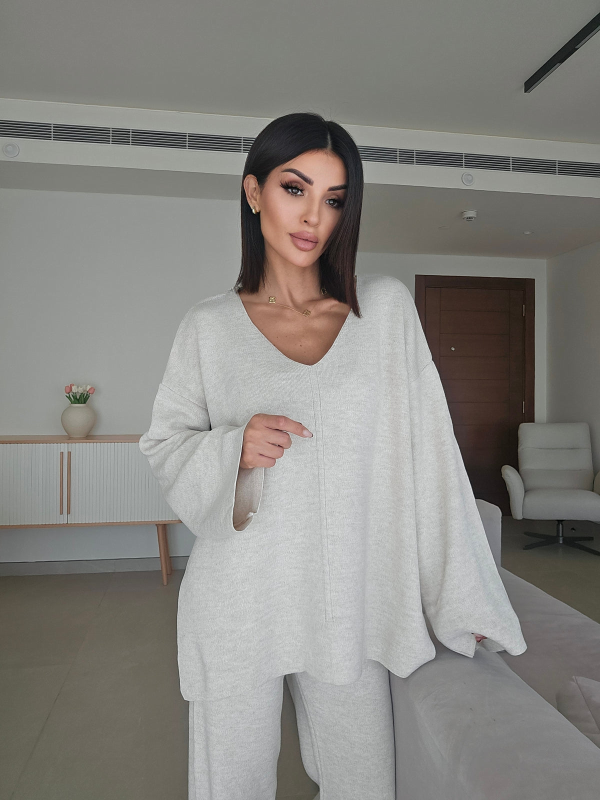 Soft knit V-neck sweater and matching wide-leg trousers co-ord set