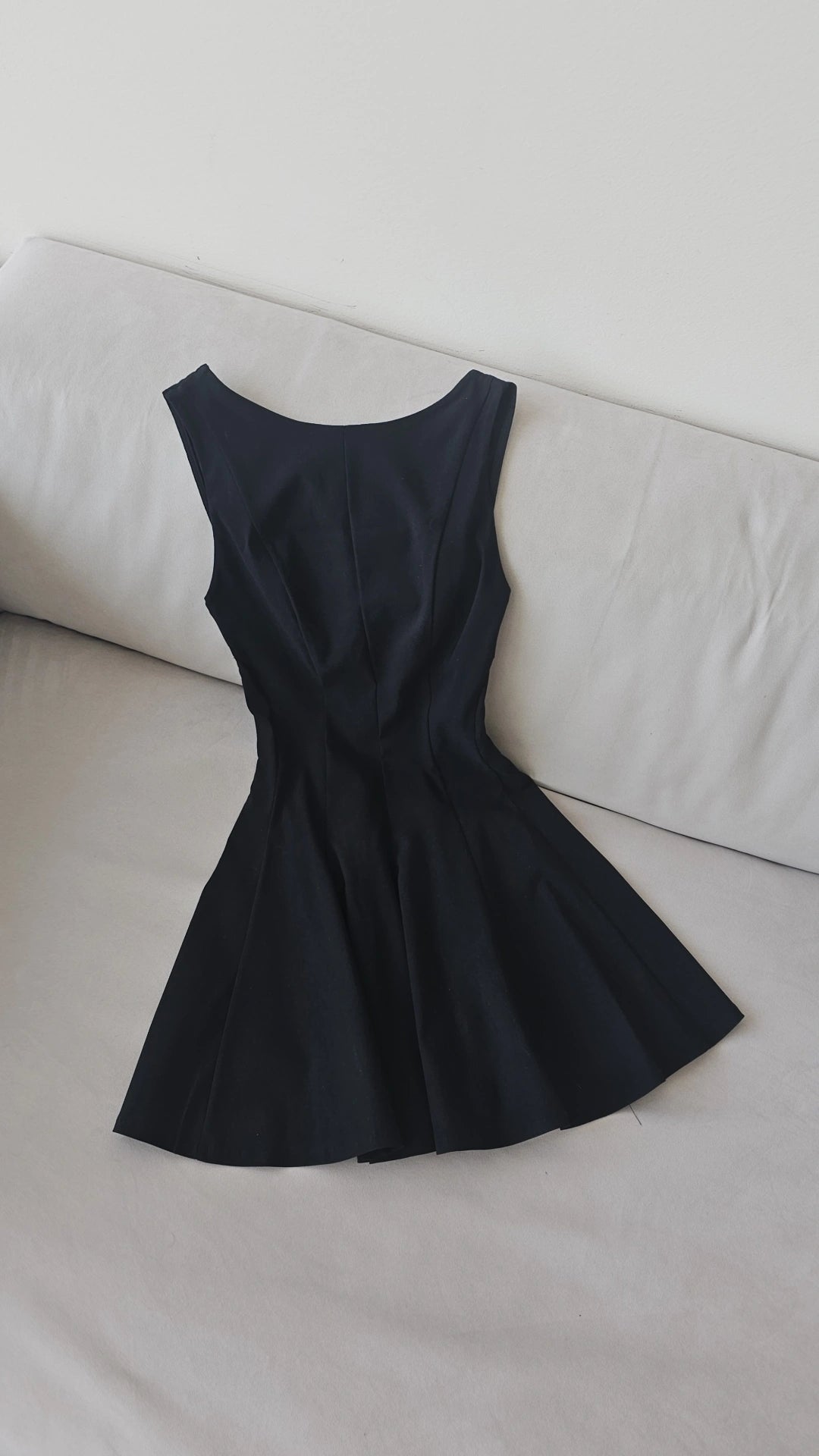 Black sleeveless panelled skater mini dress