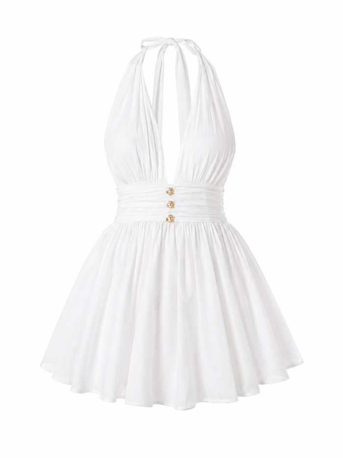 White plunging halter mini dress with a ruched waist and gold buttons