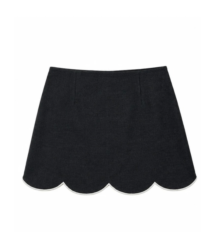Dark wash denim mini skirt with contrast scallop hem