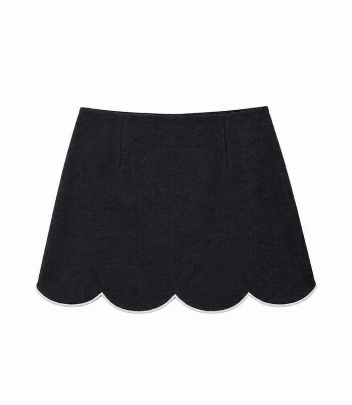 Dark wash denim mini skirt with contrast scallop hem